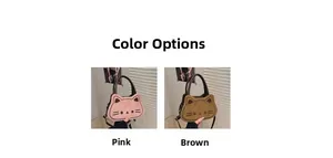 Pink and brown cat-shaped handbags featuring cute cartoon facial prints and brown handles