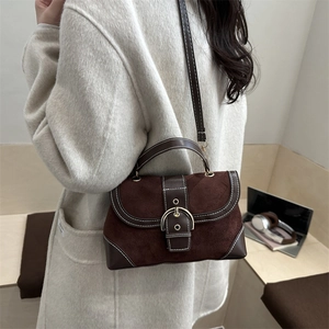 Contrast stitch vintage dark brown crossbody bag with gold buckle for winter 2025