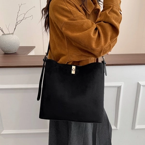 Fashionable black suede tote bag with golden lock for women, minimalist winter handbag