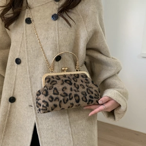 Chic leopard print shell bag with gold metal frame and chain strap for women