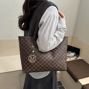 Classic dark brown tote bag with M letter pattern and metal pendant for office work