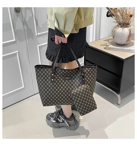 Brown monogram tote bag set with a matching pouch shown in a stylish lifestyle setting