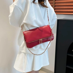 Red leather chain shoulder bag for women with dual zippers and minimalist design