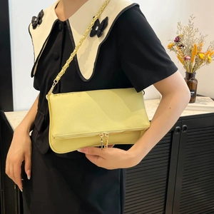 Chic yellow litchi pattern leather shoulder bag with chain strap for modern women