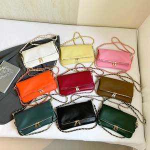 Litchi texture crossbody bags with metal chain straps available in nine vibrant colors