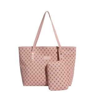 Pink monogram tote bag set with matching pouch and gold logo plaque on white background
