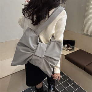 Fashionable oversized grey bow-knot tote bag made of sleek nylon for women