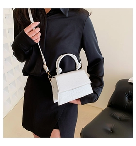 Chic white croc-embossed small square bag with unique knotted handle and adjustable strap