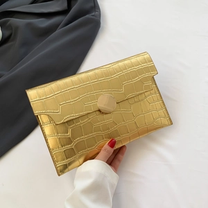 Chic gold envelope clutch with faux crocodile texture for women stylish party accessory