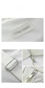 Detailansichten der weißen Nylon-Tasche mit Logo, Metallschnalle und Reißverschluss