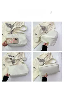 Detailansicht der weißen Nylon-Umhängetasche mit verstellbarem Gurt und kleinem Beutel