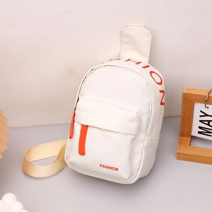 Close-up of white nylon chest bag for kids with orange zippers and FASHION logo detail