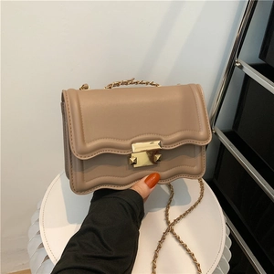 Fashionable khaki crossbody bag with wave texture flap and golden chain handle