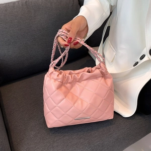 Pink quilted cloud bag with silver chain strap and elegant rhombus stitching design