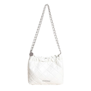 Minimalist white quilted crossbody bag with silver chain strap and drawstring closure