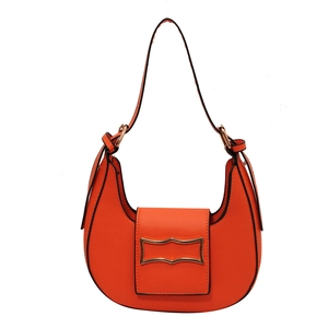 Chic orange faux leather half-moon shoulder bag with golden bow clasp and black trim
