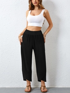 Women's high waist black cotton linen wide leg trousers with petal cuff detailing