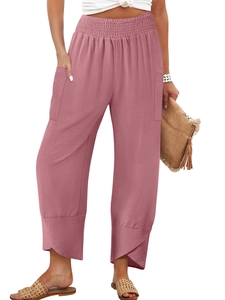 Detail of dusty pink linen wide leg pants with high elastic waist and tulip hem