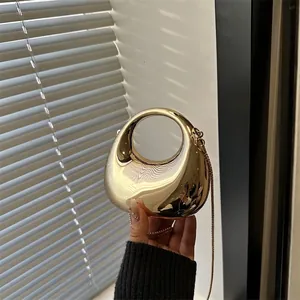 Chic gold crescent acrylic handbag with round handle and thin metal chain for evening