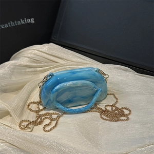 Chic blue marble acrylic evening clutch bag with round handle and gold chain strap