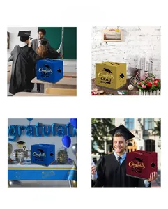 Detail of cubic graduation card boxes with gold foil Congrats Grad lettering in three colors
