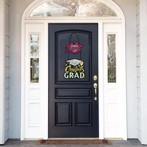 Hanging 2026 graduation party door sign featuring Congrats Grad text and cap design