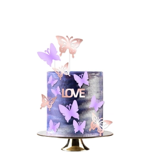 Purple and rose gold butterfly cake topper set with LOVE sign on marble cake
