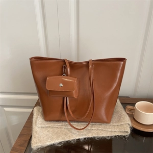 Minimalist brown large capacity tote bag with small matching pouch for daily commute