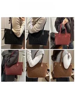 Detailed model shots of leopard print large capacity tote bags in multiple colors