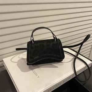 Black leopard print crossbody bag with dual handles and long strap for women's fashion