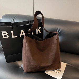 Minimalist dark brown suede tote bag with large capacity and wide shoulder strap
