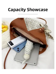 Vue détaillée de la capacité du sac fourre-tout avec tablette, mobile et batterie