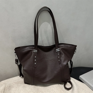 Large dark brown PU leather tote bag with silver star studs and twin shoulder straps
