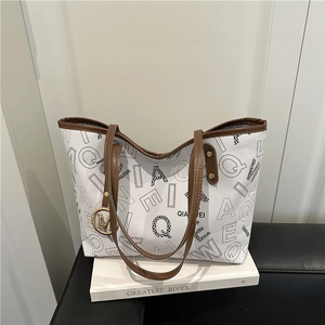 Fashionable large printed tote bag with leopard letters and a round metal M pendant