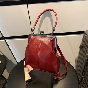 Retro dark red oil wax leather doctor bag with white stitching and top handle