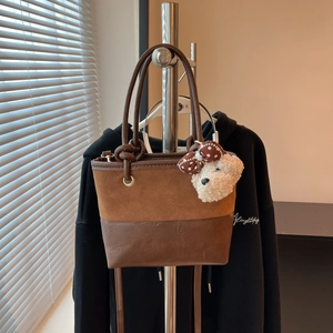 Brown patchwork suede and leather bucket bag with cute plush bear charm for women
