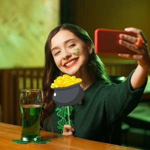 St. Patrick's Day party set with shamrock glasses, green accessories, and festive decor