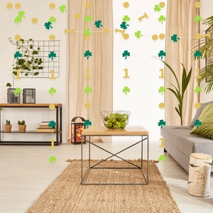 St. Patrick's Day shamrock garland with gold glitter number one for first birthday party