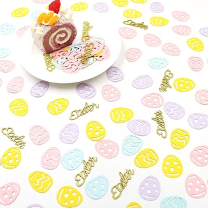 Colorful Easter egg confetti and gold glitter Easter letter cards for party table decor