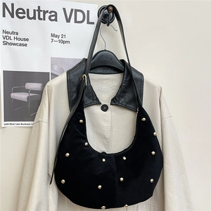 Retro black suede hobo bag with gold studs and slender leather strap for women