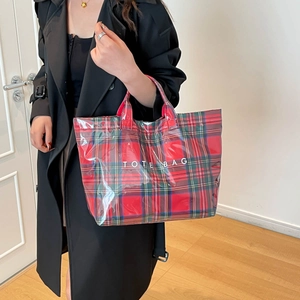 Waterproof PVC tote bag with red and green plaid pattern and white Tote Bag text