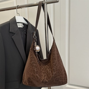 Retro leopard print hobo bag with wide strap and baseball charm for women