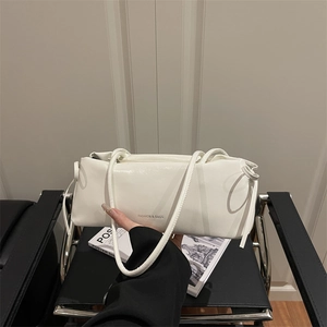 Chic white patent leather baguette shoulder bag with minimalist fashion lettering