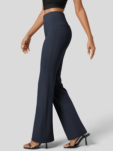 Detail of high waist yoga flare pants showing the functional side pocket and elastic fabric