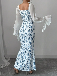 Women's vintage floral long dress with puff sleeves and backless fishtail design