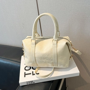 Cream vintage leather boston bag with Fashion Air Paris embossing and shoulder strap