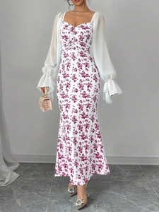 Close-up of heart neckline and floral print detail on long sleeve mermaid dress