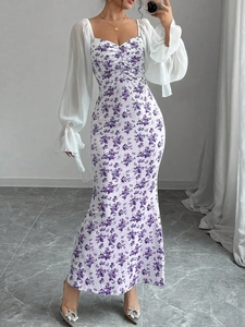 Detail of floral V-neck dress with white lantern sleeves and delicate drawstring chest