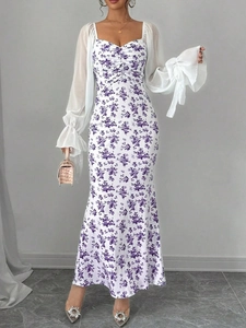 Close-up of elegant purple floral dress featuring white chiffon lantern sleeves