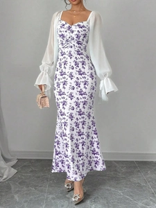 Detail of floral print dress with chiffon lantern sleeves and ruffled cuffs